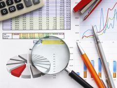 iStock_Magnifying_Glass_and_Spreadsheets_000014554832Large-8c81ca39.jpg